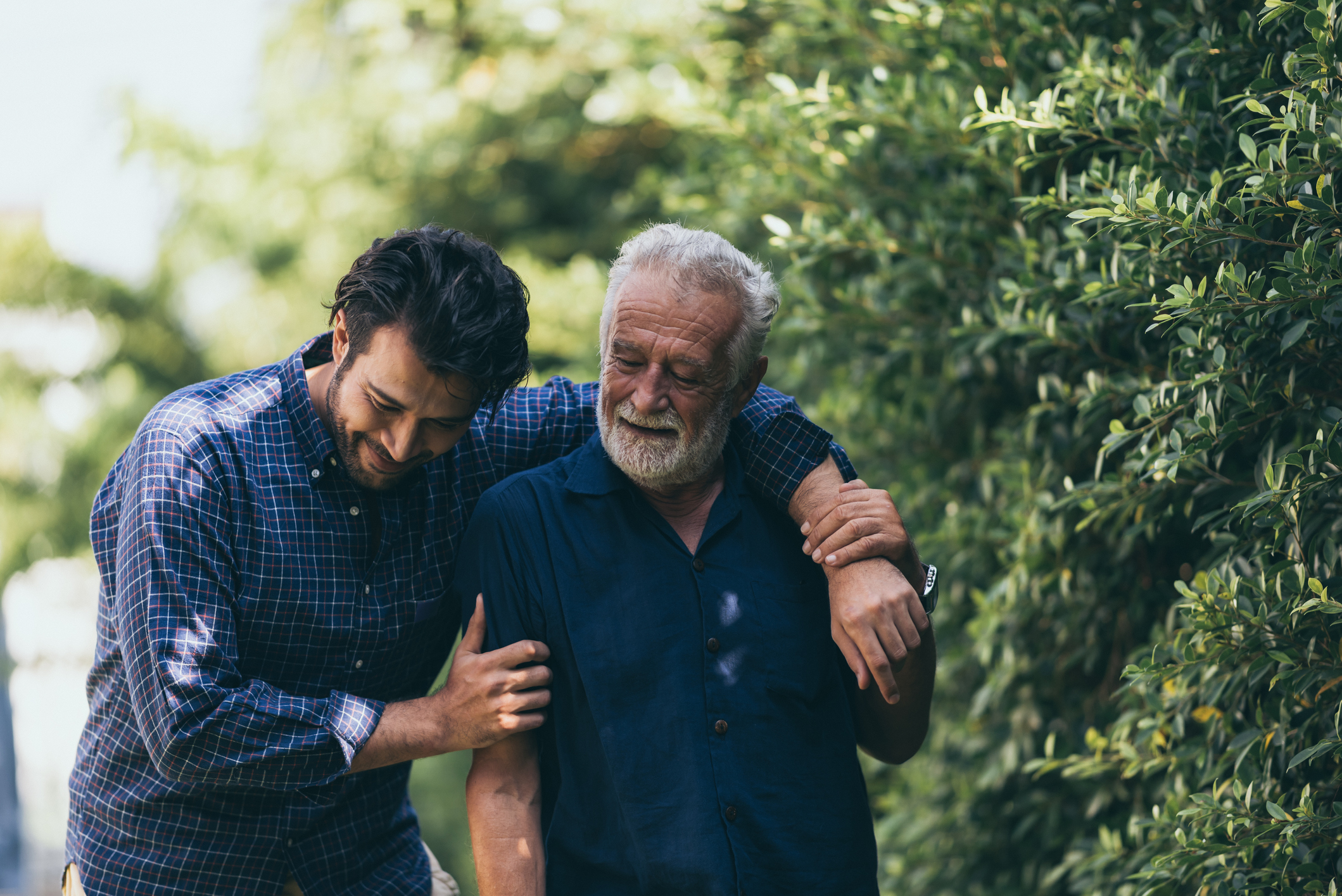 Caregiver providing support to family member.